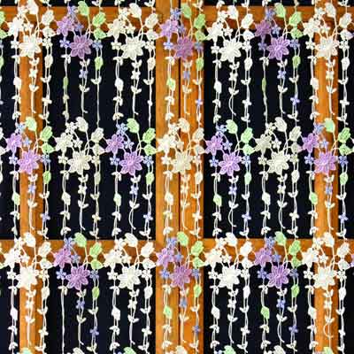 Spring themed macrame curtain